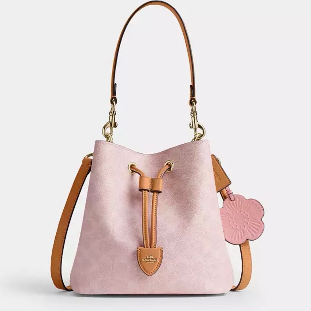 Coach Rowan Bucket Bag
In Signature Canvas With Charms